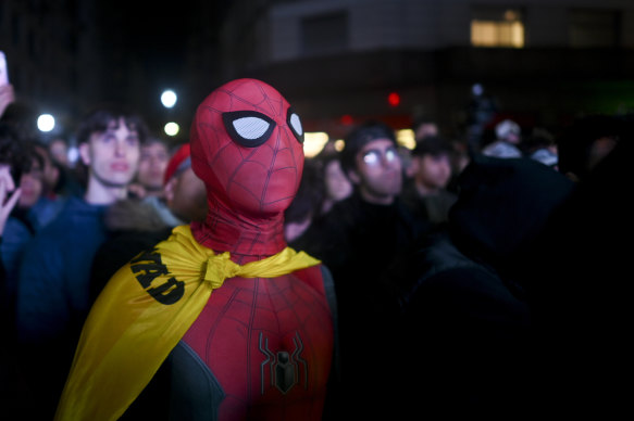 A follower of Javier Milei, presidential candidate of the Liberty Advances coalition, dress as Spiderman stands outside his campaign headquarters after polling stations closed in Buenos Aires.