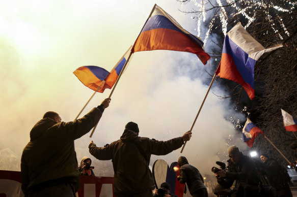 Celebrations in Donetsk late on Monday after Russian President Vladimir Putin recognised the breakaway republic as independent from Ukraine.