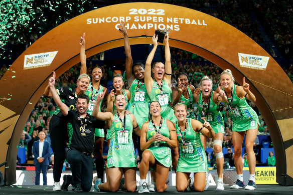 The West Coast Fever celebrate their grand final win.
