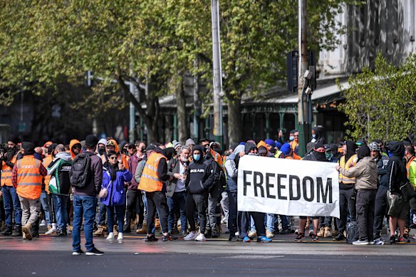 Construction workers protest in the city on Tuesday.