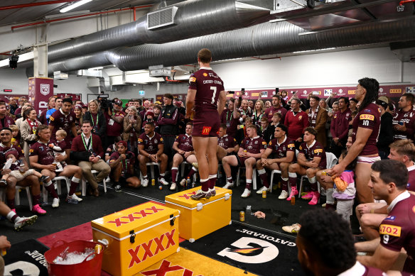 Daly Cherry-Evans holds court in the Queensland dressing room after their Origin II win.
