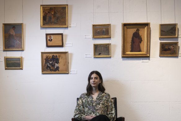 Leonard Joel’s head of art Olivia Fuller with paintings by Ethel Carrick Fox and Emanuel Phillips Fox.