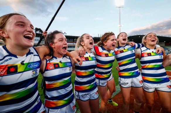 The Cats celebrate a win during Pride Round.