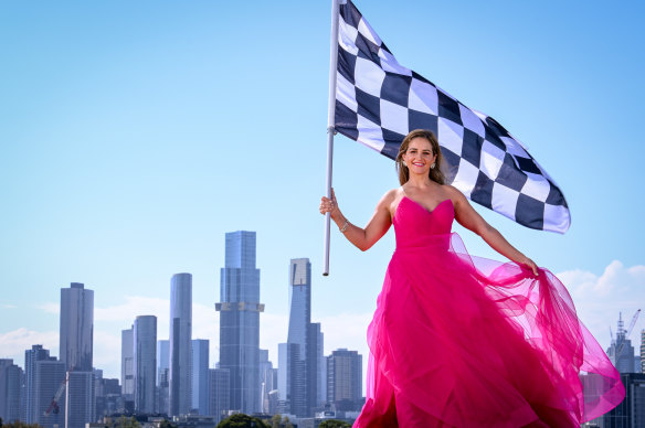 Jockey Michelle Payne, wearing a John Cavill dress and Stephanie Browne jewels, has her ticket to the Glamour on the Grid party. 