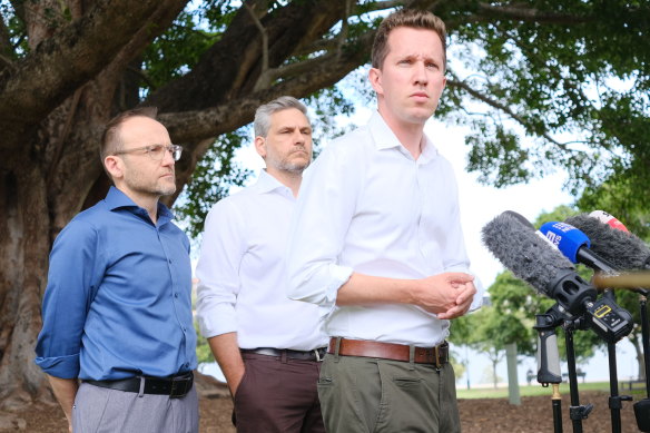 Federal Greens leader Adam Bandt, state MP for Maiwar Michael Berkman and federal MP for Griffith Max Chandler-Mather at a press conference on Monday.