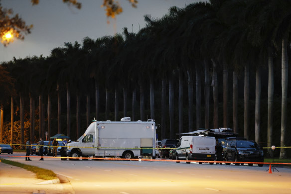 Police crime scene vehicles at Trump International Golf Club after police closed off the area following the apparent assassination attempt.