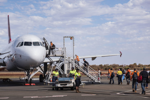 BHP employees at Newman airport in the Pilbara