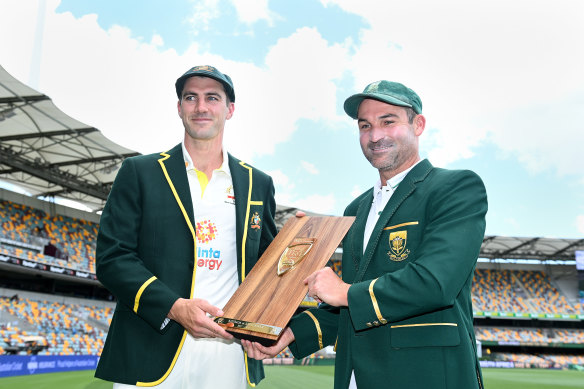 Test captains Pat Cummins of Australia and Dean Elgar of South Africa at the Gabba on Friday
