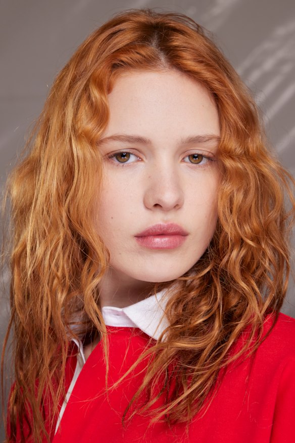 Using a smoothing hair mask after showering and before styling can help lock in moisture. 