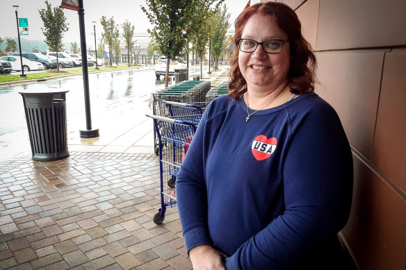 "I don't like his boasting." Whole Foods shopper Amy Russo votes Democrat.