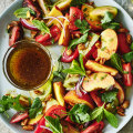 Julia Busuttil Nishimura’s heirloom tomato salad with peaches, mint and almonds.