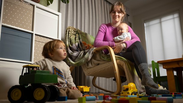 Anna Gilmore, pictured at home with her two children, is concerned about the stripped state funding for sleep programs.