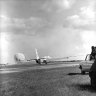 U-2 plane soon after landing with its braking parachute billowing behind.