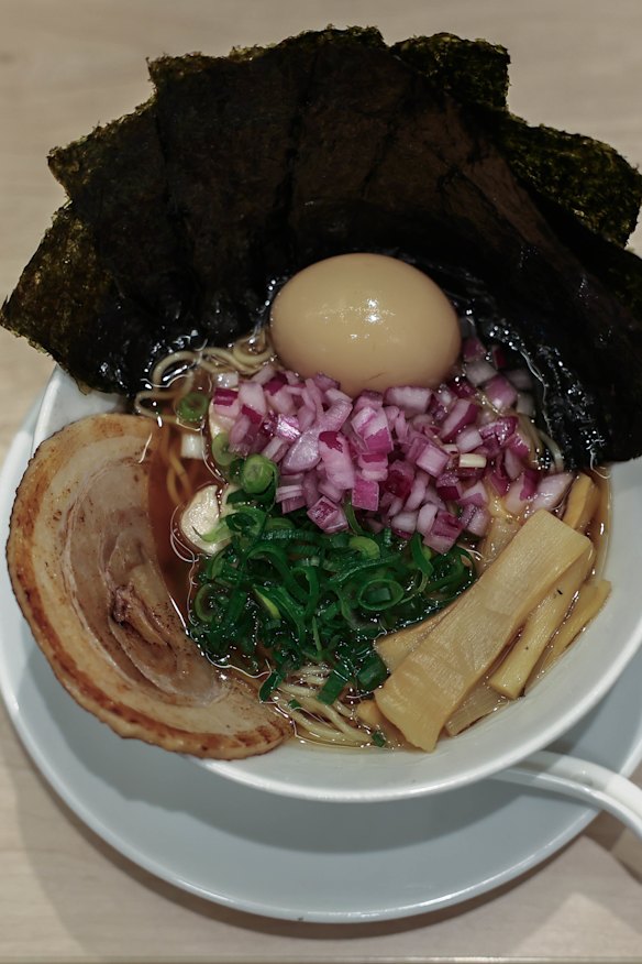Niboshi, a clear broth made from dried baby sardines, topped with both chicken and a fat slice of pork chashu.