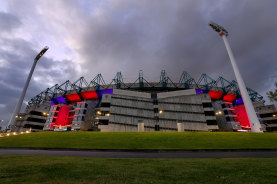 The MCG was lit up in Melbourne colours when the Demons won the 2021 flag in Perth.