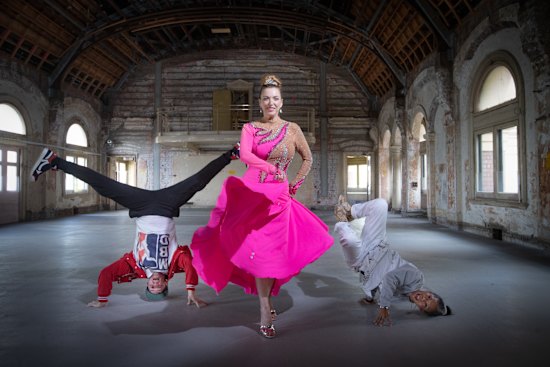 Rising artistic director Hannah Fox, centre, with breakdancers Michael Fox and Demi Sorono in the Flinders Street Station ballroom.
