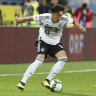 German soccer boss admits mistakes in Ozil furore