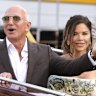 Jeff Bezos, left, and Lauren Sanchez leave their pre-wedding reception, in Venice, Italy.