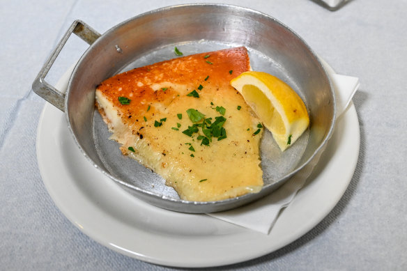 The stretchy, caramelised cheese saganaki, which comes with a wedge of lemon.