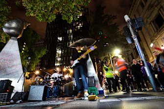 Buskers entertain the crowd during White Night Melbourne in previous years.