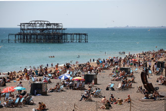 England's Brighton Beach and other popular holiday spots have been busy since coronavirus restrictions were eased.