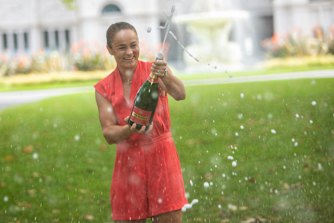Ash Barty celebrates on Sunday after winning the Australian Open.
