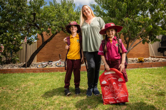Tara Richards, with her children Sam, 7 and Scarlett, 5, says her kids need the stimulation of school.