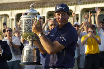 Phil Mickelson holds the Wanamaker Trophy after winning the 2021 PGA Championship.