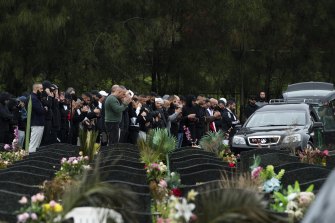 Mourners farewell Omar Zahed at Rookwood Cemetery on Friday. 