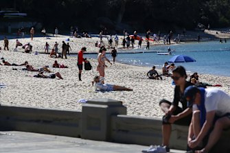 Crowds enjoying the sun at Balmoral beach. 