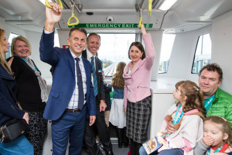 Better days: Transport for NSW secretary, Rodd Staples, centre, with Transport Minister Andrew Constance, left, and Premier Gladys Berejiklian at the opening of Sydney’s first metro rail line in May 2019.