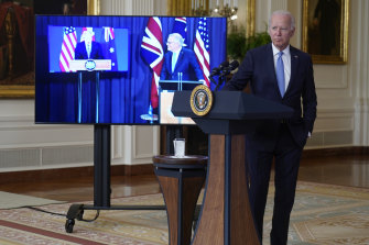 US President Joe Biden virtually alongside British Prime Minister Boris Johnson and Australian Prime Minister Scott Morrison in the East Room of the White House.