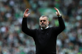 Ange Postecoglou salutes the Celtic fans after sealing the Scottish league title.