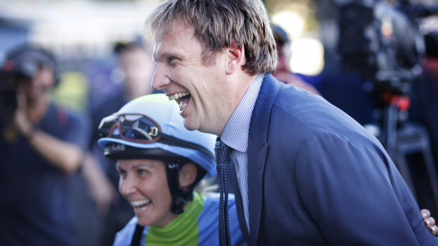 Trainer Bjorn Baker shares a laugh with jockey Rachel King.