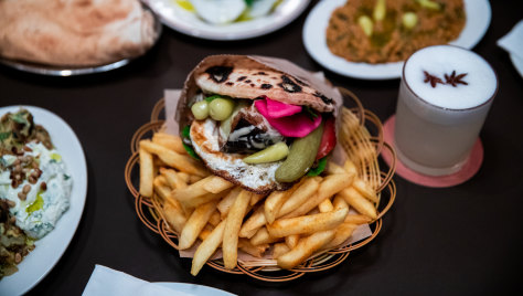 The packed-to-the-brim eggplant pita includes a fried egg and Lebanese garlic sauce.