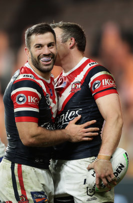 All smiles ... Teddy celebrates after a Brett Morris try on Monday night.