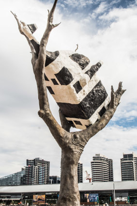 Where would you find John Kelly’s Cow Up A Tree sculpture?