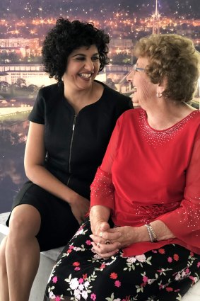 ActewAGL retail general manager Ayesha Razzaq (left) with the Enlighten competition winner Val Whitford.