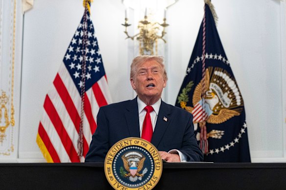 President Donald Trump speaks to troops via video from his Mar-a-Lago estate.