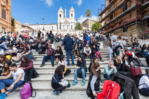 Tourists crowd Rome’s Spanish Steps.