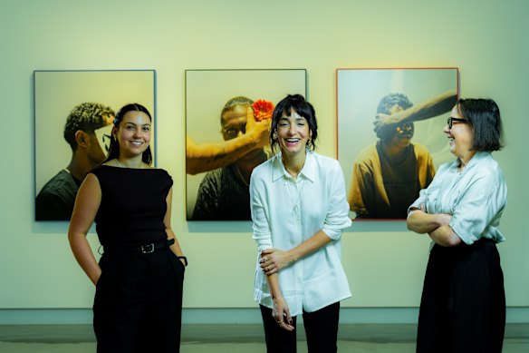 Hoda Afshar (centre) with curators Shanysa McConville (left) and Charlotte Day (right).
