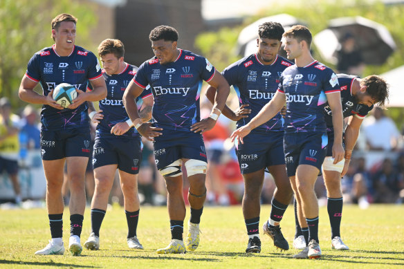 Rebels players prepare for a scrum during the Super Rugby Pacific Trial Match between Melbourne Rebels and NSW Waratahs.