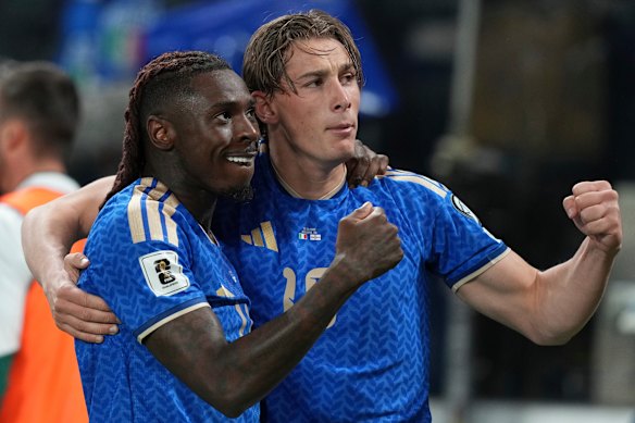 Moise Kean and Francesco Pio Esposito celebrate the former’s goal for Italy.