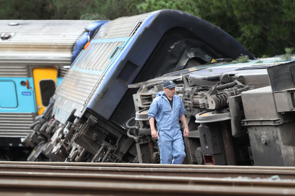 Police inspectors at the scene on Friday.
