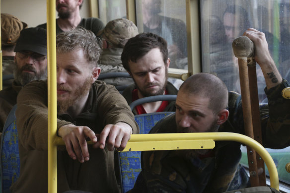 Ukrainian servicemen sit in a bus after they were evacuated from the besieged Mariupol’s Azovstal steel plant.