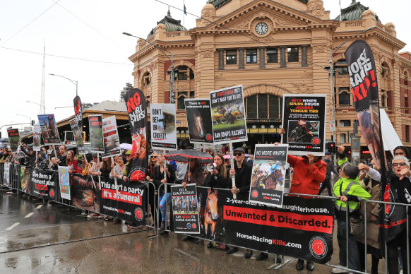 Protesters demonstrate alongside Flinders Street Station during last year’s Melbourne Cup parade.