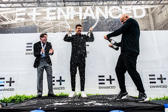 Kristian Gkolomeev (centre) after lowering the 50m freestyle world record. It will not be officially registered because he was taking performance-enhancing drugs. 