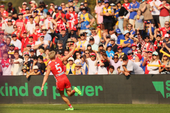 Sydney’s Isaac Heeney soaks up the intimate atmosphere at the Mt Barker oval in the Adelaide Hills, where his team played West Coast on Saturday.