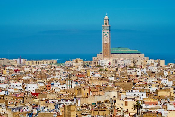 The minaret of Hassan II mosque towers over the rooftops of Casablanca’s old Medina. 