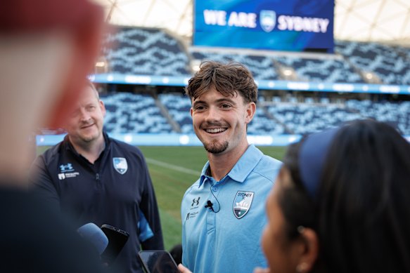James Overy speaks to the media in Sydney on Monday.